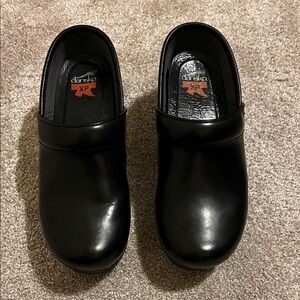 Dansko Sleek Black Leather Clogs